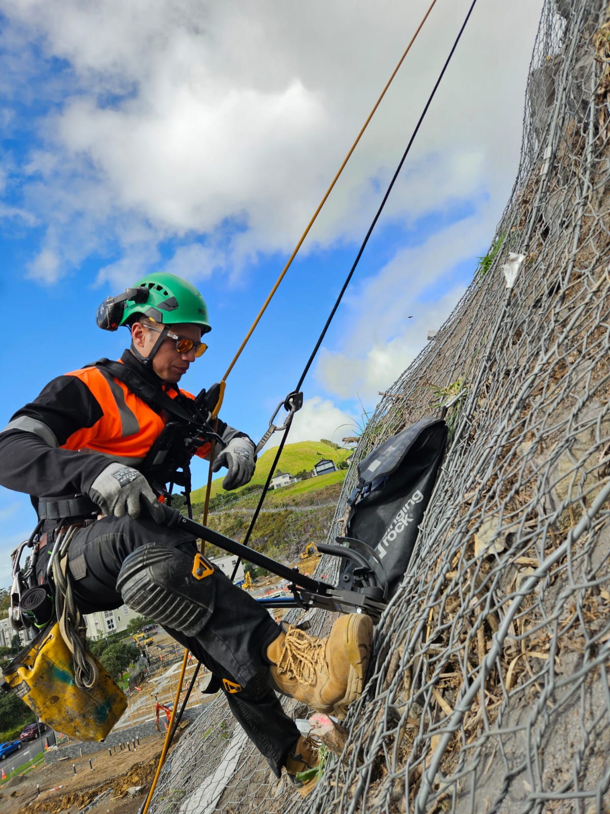 Rope access technician on the Stonefields rock face