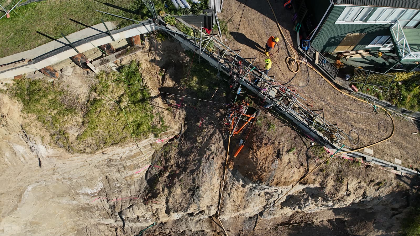 Rope access drilling on a steep slope face
